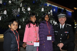 Commissioner with the winner of the Met’s Christmas Tree Campaign poster design competition.