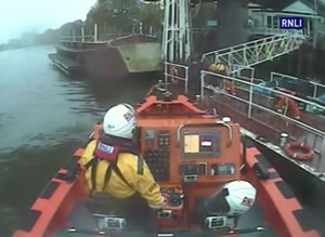 Lifeboat approaching pontoon during another rescue